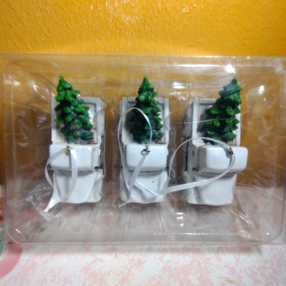 Three White Pickup Trucks With Christmas Trees Ornaments